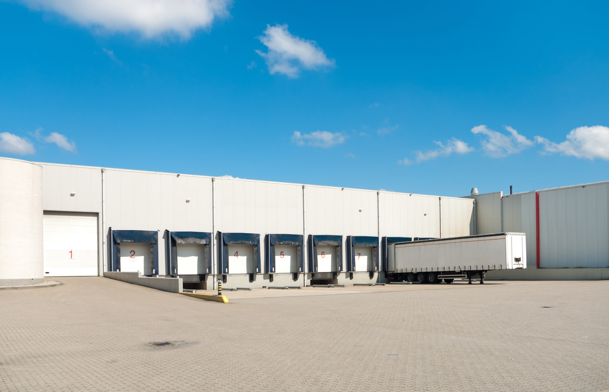 Trucking terminal and logistics building with loading docks